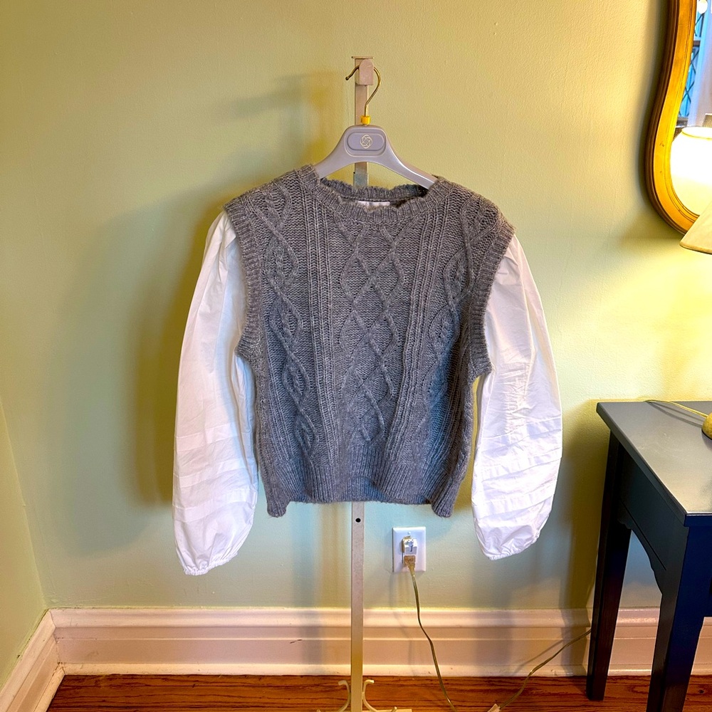 Design History Size L grey sweater with White blouse sleeves.